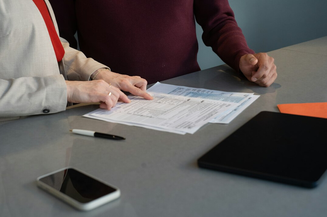 entrepreneur signing papers